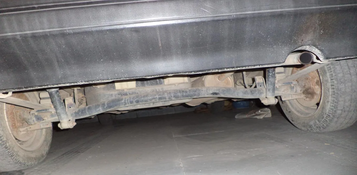 The car’s original dead rear axle, before the conversion.